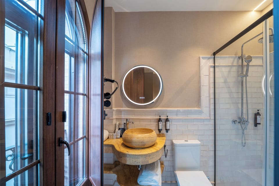 Standard Double Room | Bathroom | Shower, hair dryer, slippers, towels