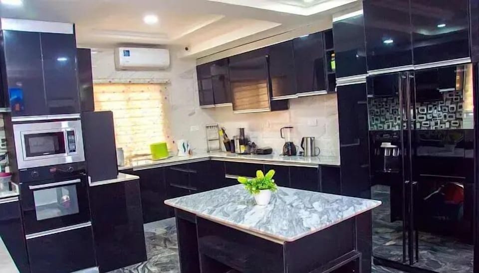 Economy Apartment, Balcony, City View | Private kitchen | Fridge, microwave, oven, stovetop