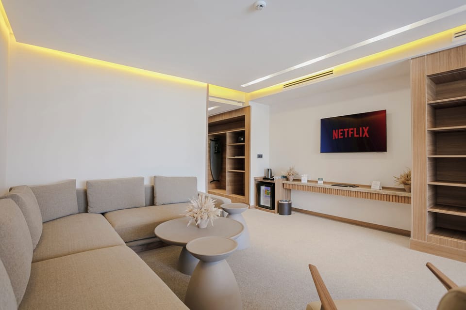 Deluxe Suite, Balcony, City View | In-room safe, desk, soundproofing, free WiFi
