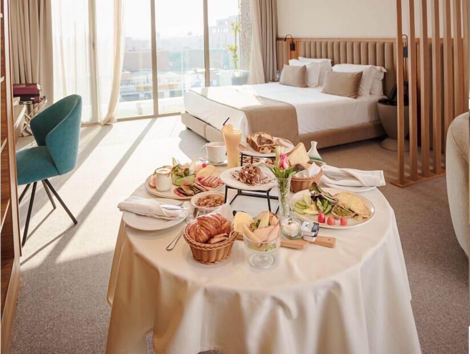 Deluxe Suite, Balcony, City View | In-room safe, desk, soundproofing, free WiFi