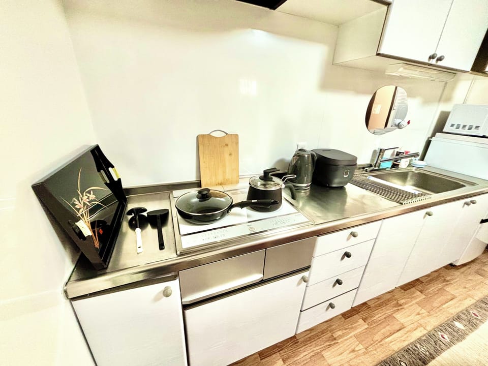 Family Room Non Smoking | Private kitchen | Full-size fridge, microwave, stovetop, rice cooker