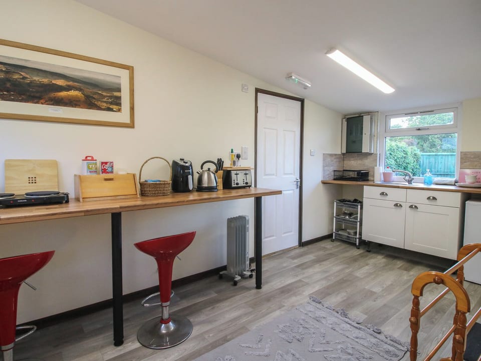 Fridge, microwave, toaster, cookware/dishes/utensils