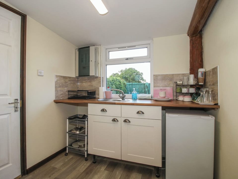 Fridge, microwave, toaster, cookware/dishes/utensils