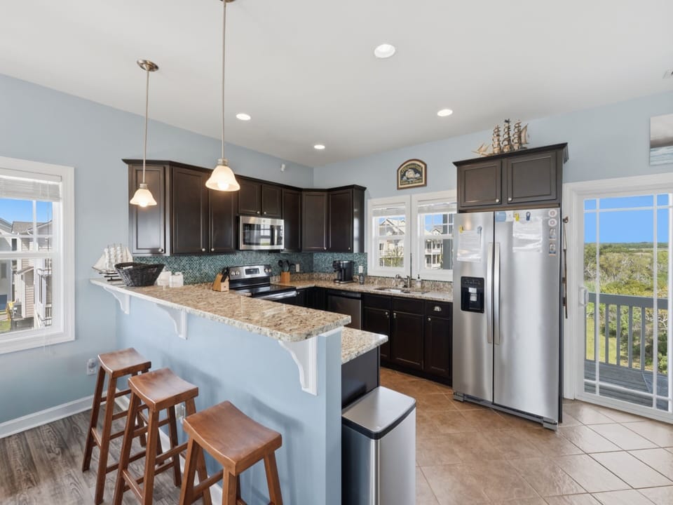 Fully Equipped Kitchen with Stainless Steel Appliances