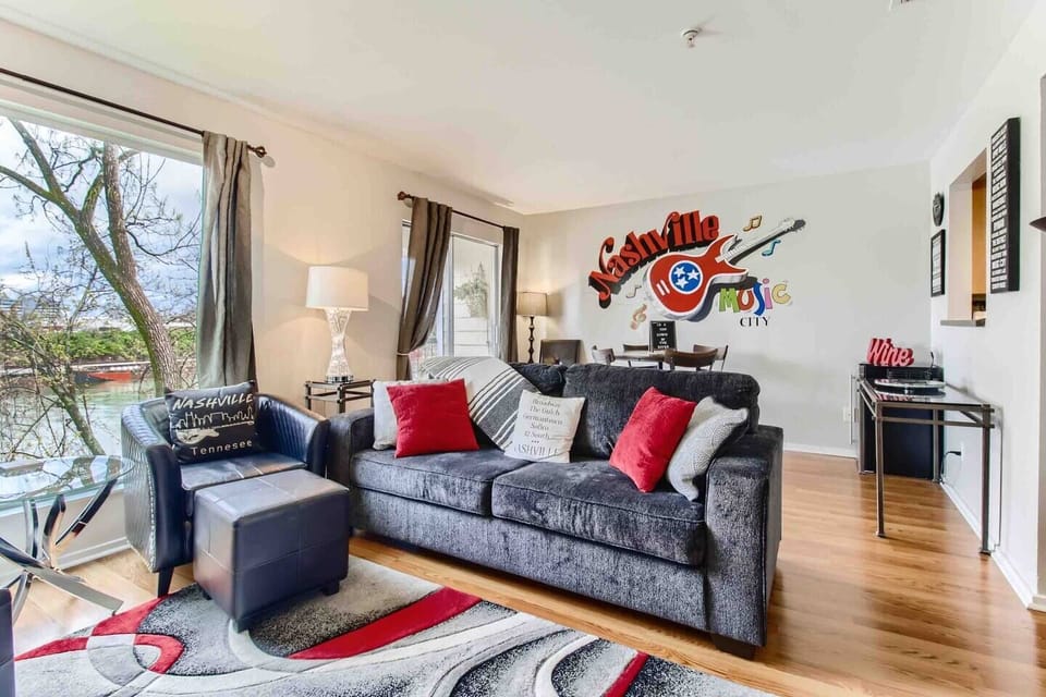 Spacious living room with queen sleeper sofa.