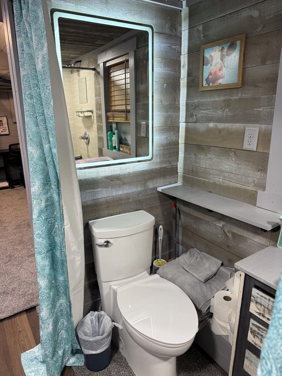 Open concept bathroom with optional curtains for privacy