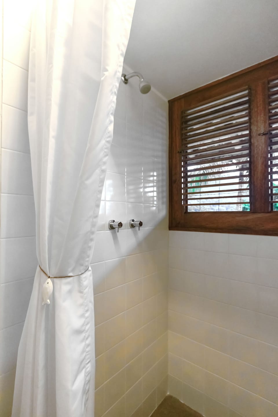 Designer toiletries, hair dryer, towels