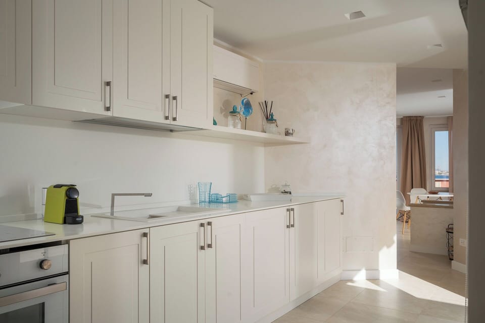 Signature Penthouse, Sea View | Private kitchen | Espresso maker, coffee/tea maker, full-size fridge, microwave
