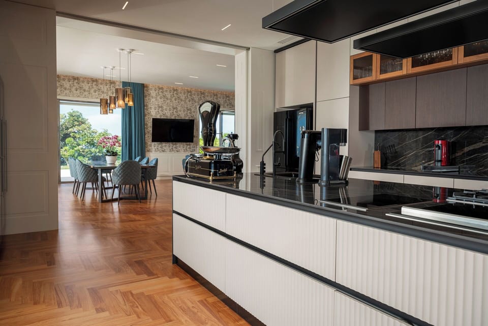 Luxury Apartment | Private kitchen | Espresso maker, coffee/tea maker, full-size fridge, microwave