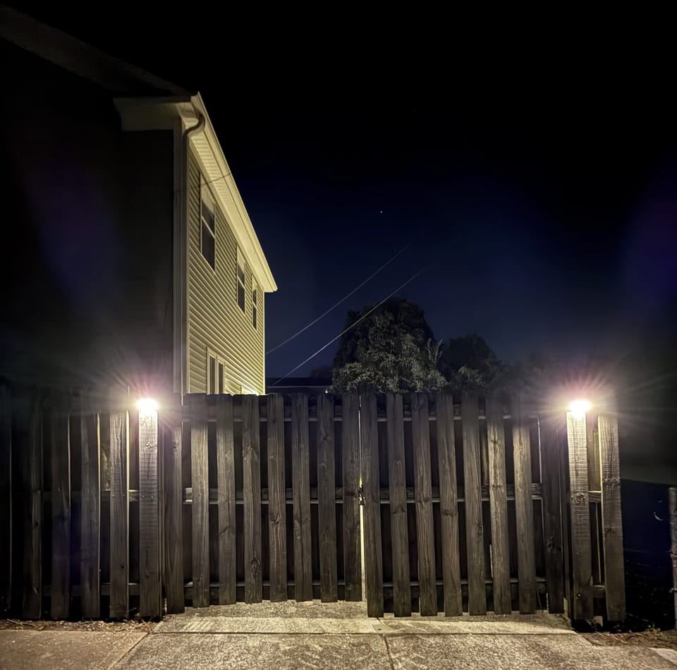 Private off-street parking for 2 vehicles behind a locked gate.