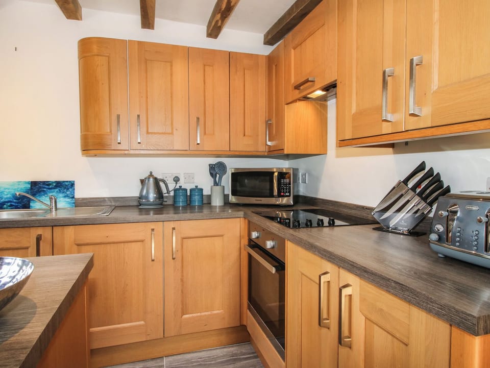 Fridge, microwave, toaster, cookware/dishes/utensils
