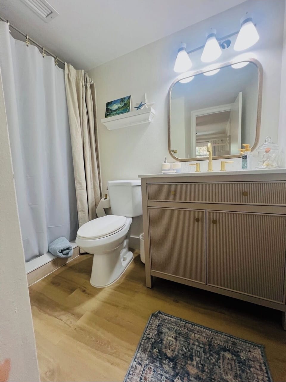        Newly updated en suite bath with modern coastal style.