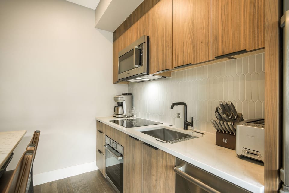 Plenty of cabinet space and a coffee maker ready to go — fuel up before heading out to the gondola