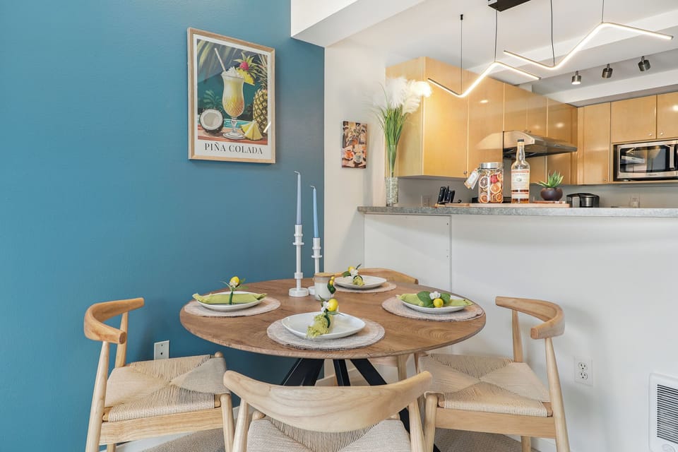 Stylish dining space adjacent to the kitchen, perfect for enjoying meals and con