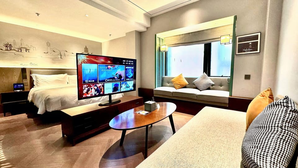 Premium bedding, down comforters, free minibar, in-room safe