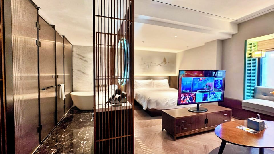 Premium bedding, down comforters, free minibar, in-room safe