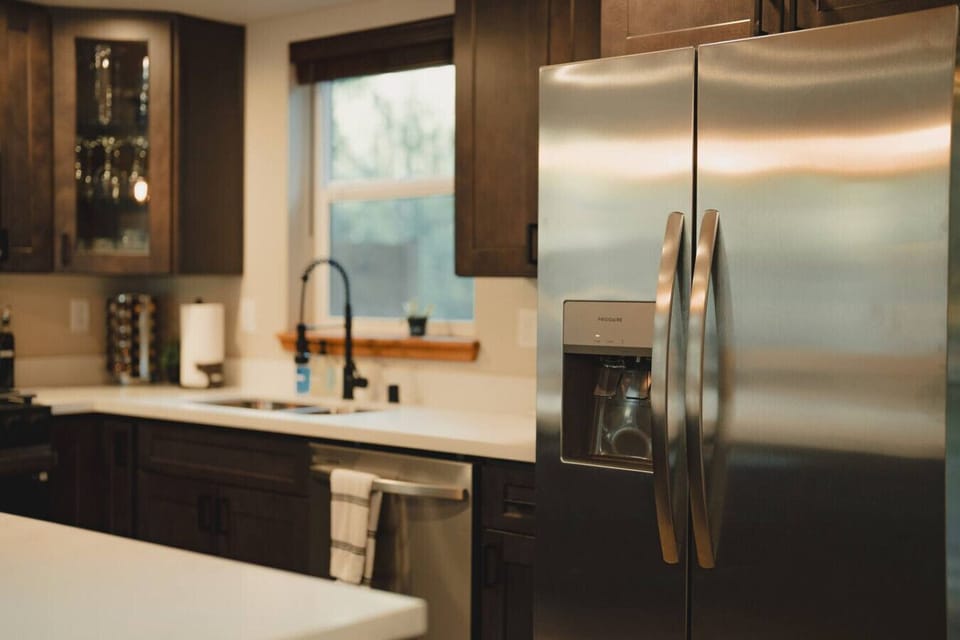 Kitchen has brand new appliances including Full size refrigerator/Freezer with Ice Maker and filtered water dispenser!