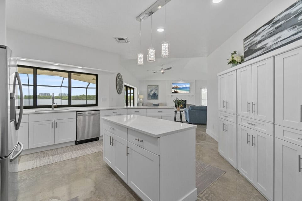 Spacious kitchen with water views and room for everyone to gather.