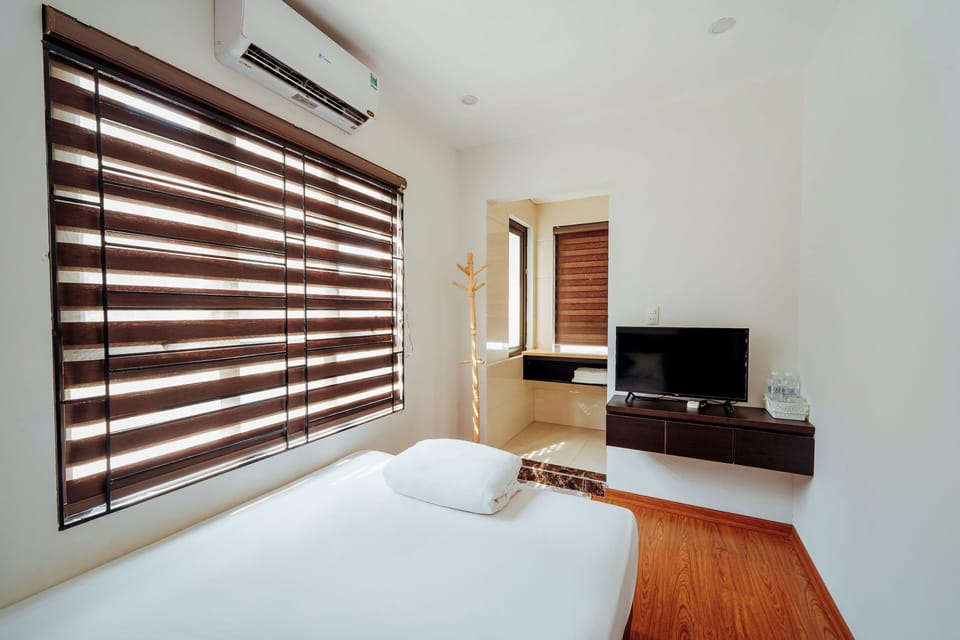 Economy Double Room | Blackout drapes, iron/ironing board, free WiFi, bed sheets