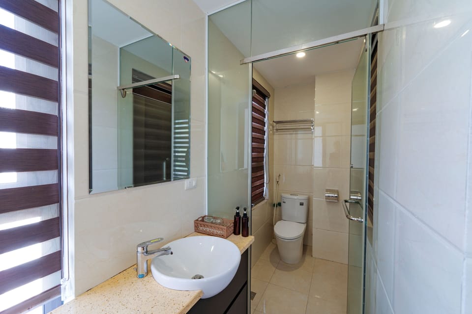 Shower, free toiletries, hair dryer, slippers