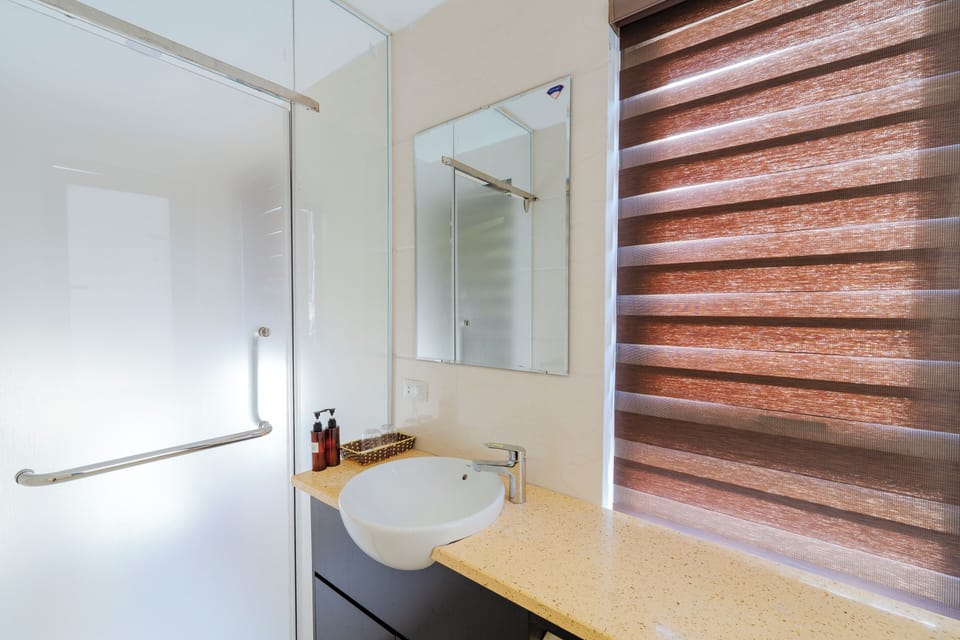 Shower, free toiletries, hair dryer, slippers