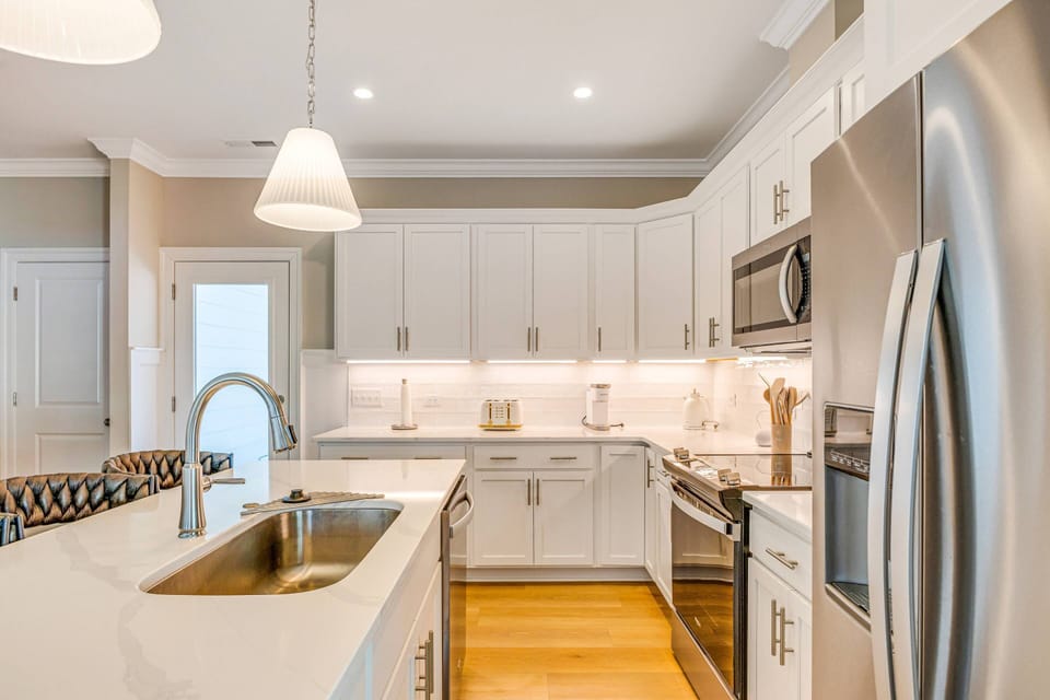 Elegant Full Kitchen With Everything You Need For Preparing Meals And Entertaining