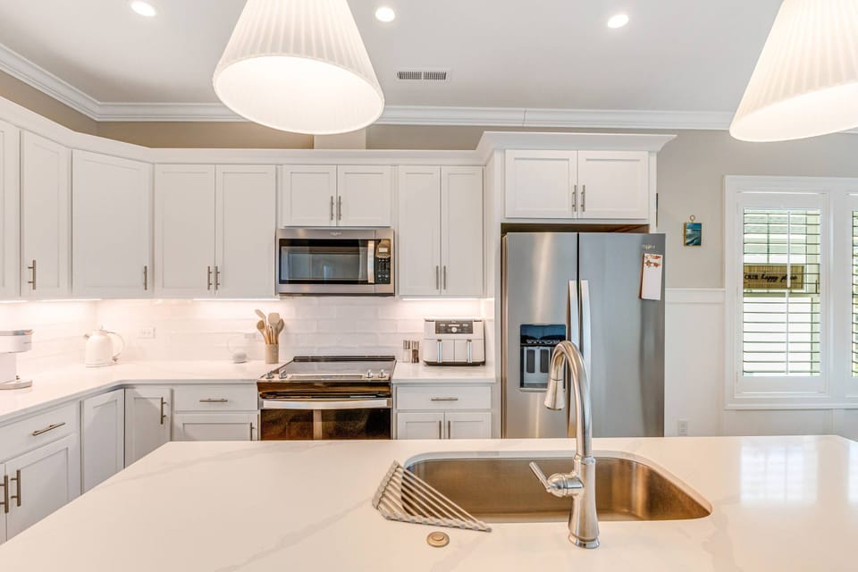 Large Kitchen Island. Eat, converse, keep the cook entertained, play games, assemble puzzles & lots of serving space.