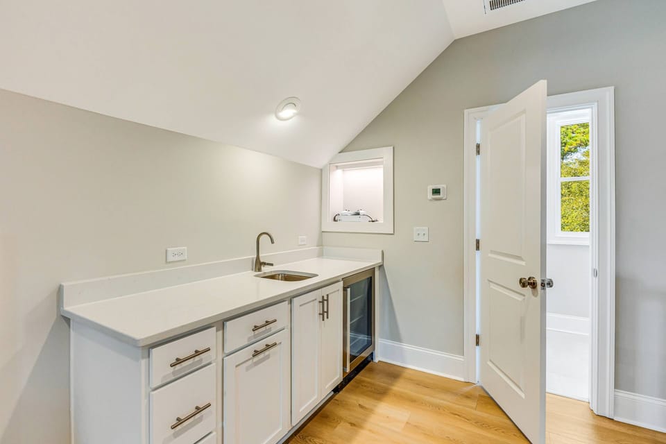 This Sink And Wine Fridge Provide Great Storage Or Another Prep Space For Snacks And Foods