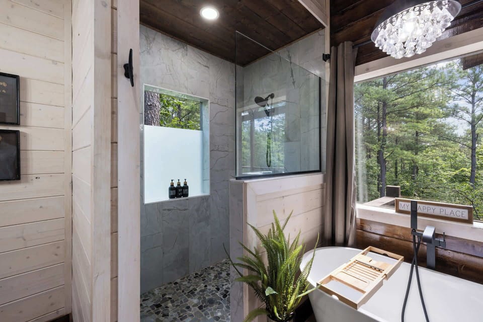 Soaking in the good life, literally. Our gorgeous bathroom is your personal sanctuary. Whether you prefer a quick rinse in the stylish shower or a long soak in the tub, pure relaxation awaits. Treat yourself!