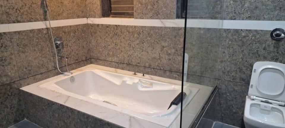 Shower, free toiletries, towels, soap