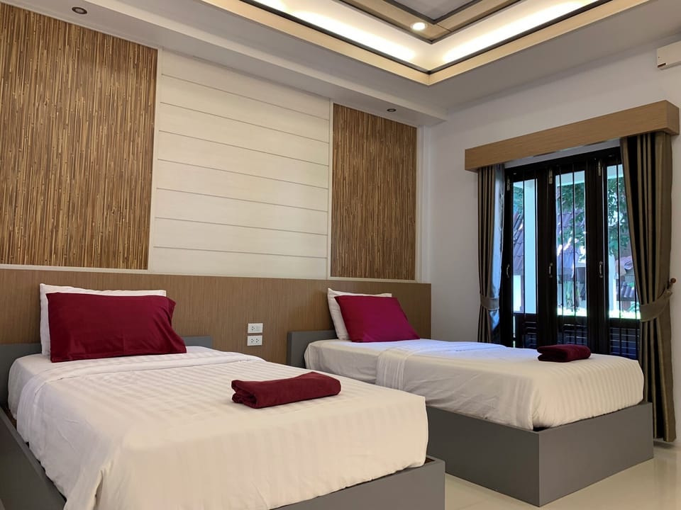 Standard Twin Room | In-room safe, blackout drapes
