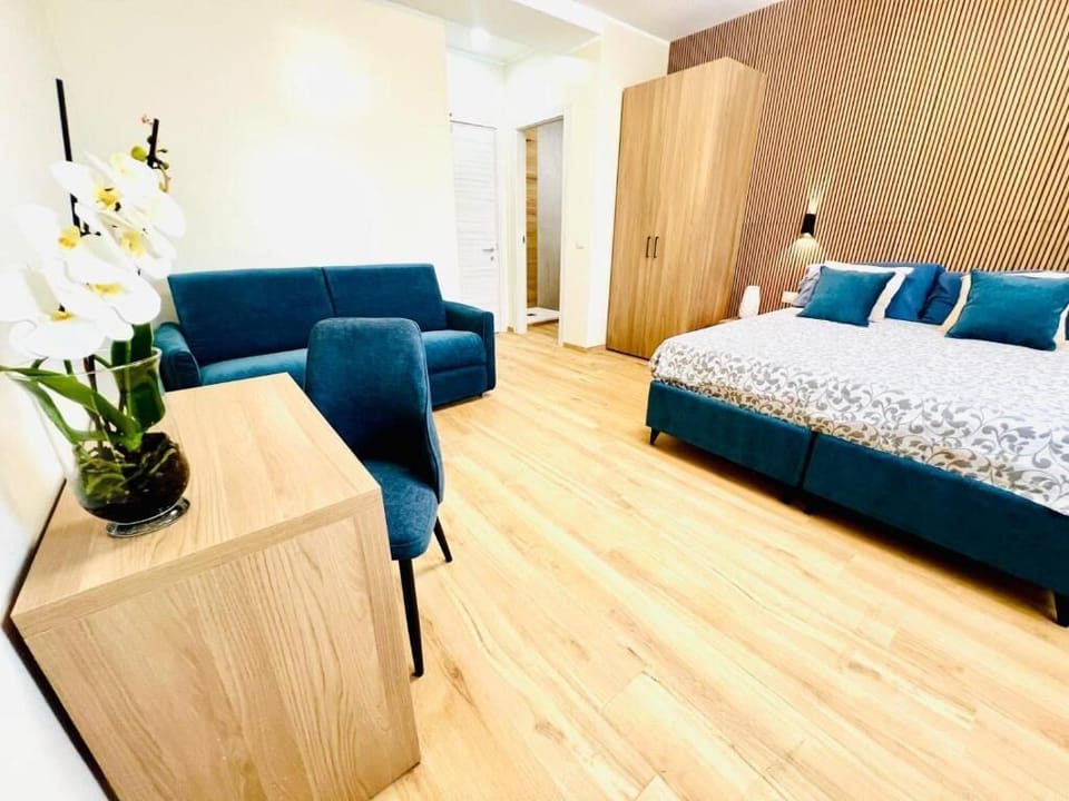 Quadruple Room, Partial Sea View | Desk, laptop workspace, WiFi (free)