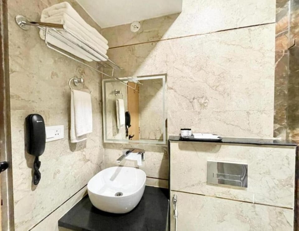 Shower, towels, soap, shampoo
