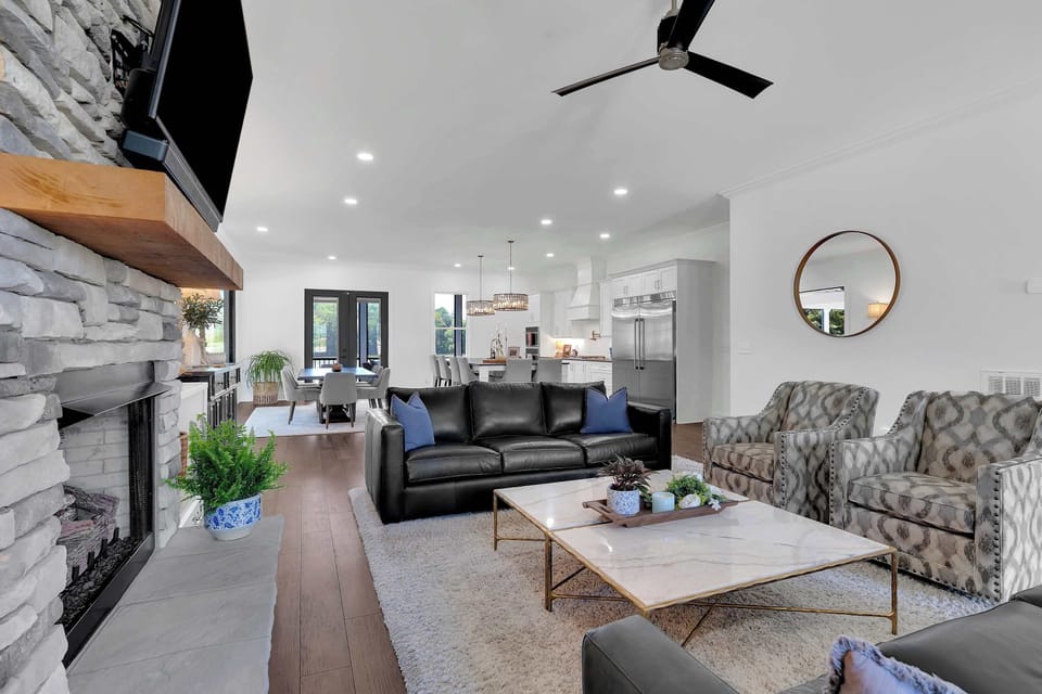 Experience stylish comfort with a sleek fireplace and vibrant views!