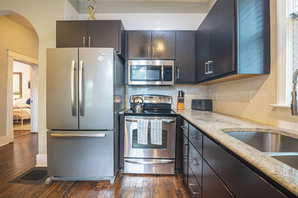 Whip up delicious meals in this sleek, modern space with stylish finishes!