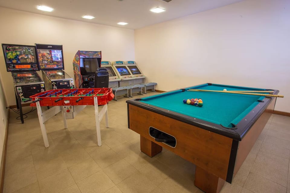 Challenge friends to pool, foosball, and classic arcade fun.
