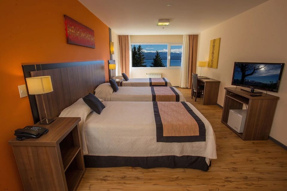 Drift off with serene lake views from every bed.