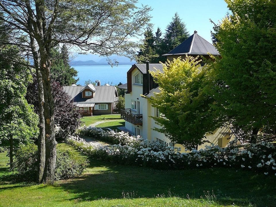 Stroll through flowering gardens with calming lake breezes.