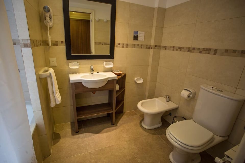 Start the day at a spacious vanity with ample counter space.