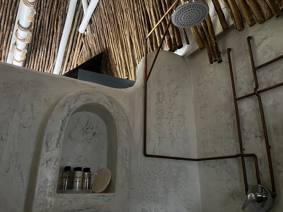 Family Suite | Bathroom | Shower, bathrobes, slippers, towels