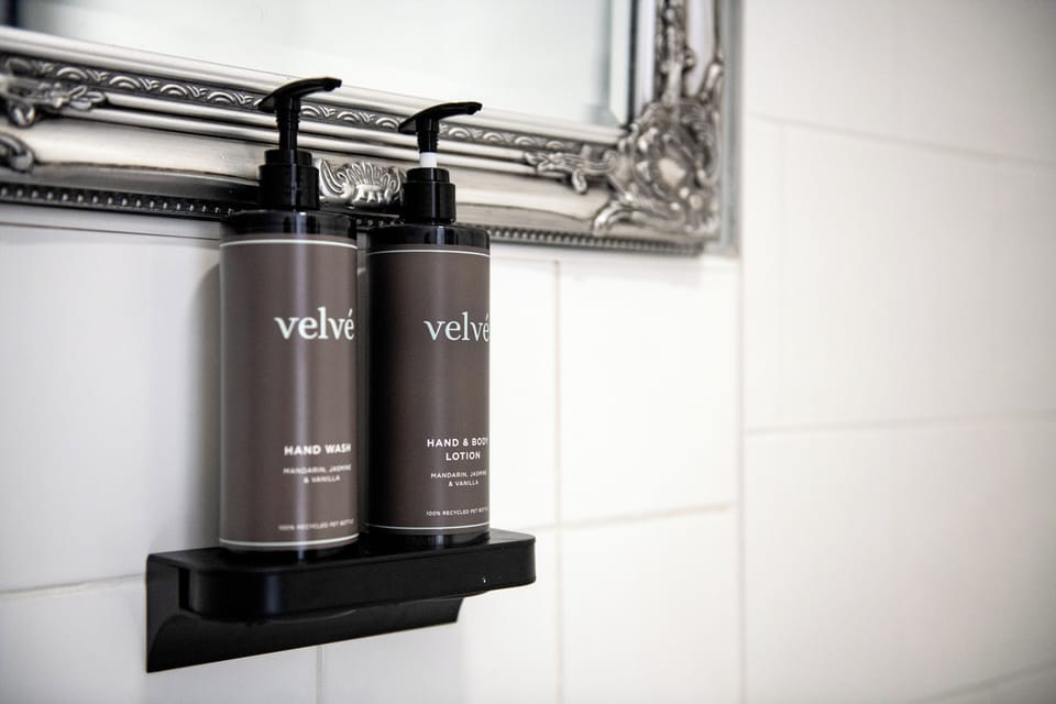 Hair dryer, towels, soap, shampoo