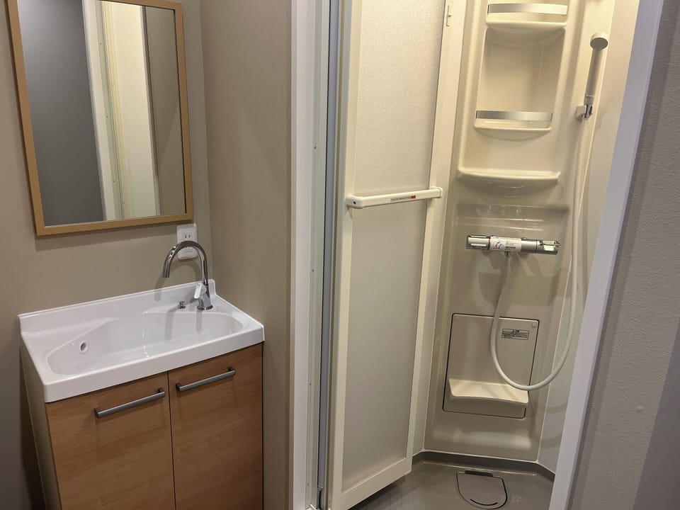 Shower, free toiletries, hair dryer, bathrobes