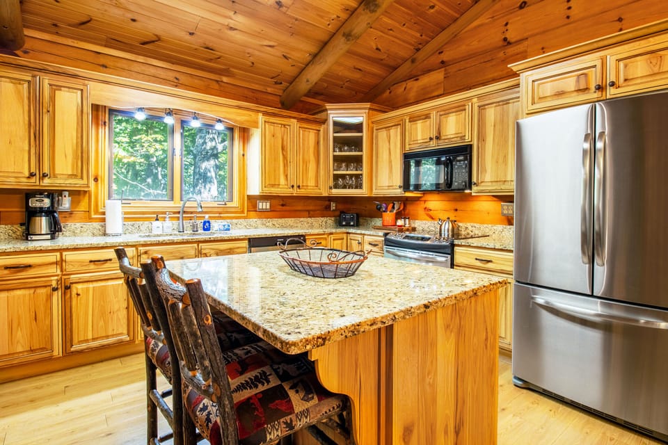 Full kitchen includes stove top, oven, refrigerator, microwave, dishwasher, and more!