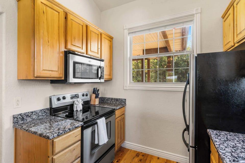 The inviting kitchen offers ample space & all the comforts of home​