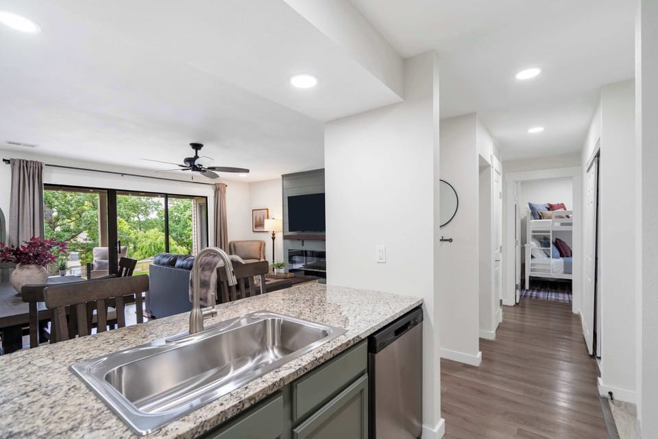 The open kitchen offers ample space & all the comforts of home​
