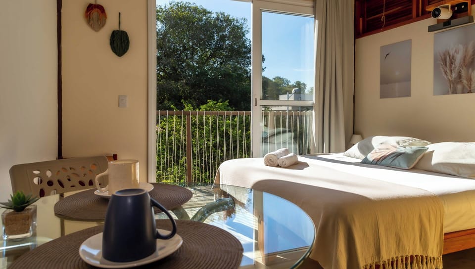 Deluxe Suite, Balcony, Garden View | Iron/ironing board, WiFi (free)