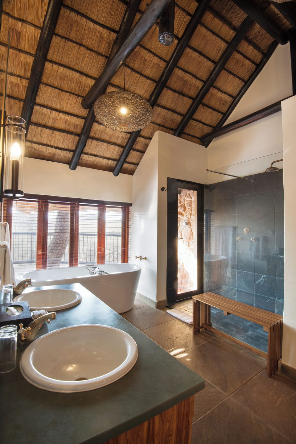 Tshukudu Executive Suite | Bathroom | Designer toiletries, hair dryer, bathrobes, slippers