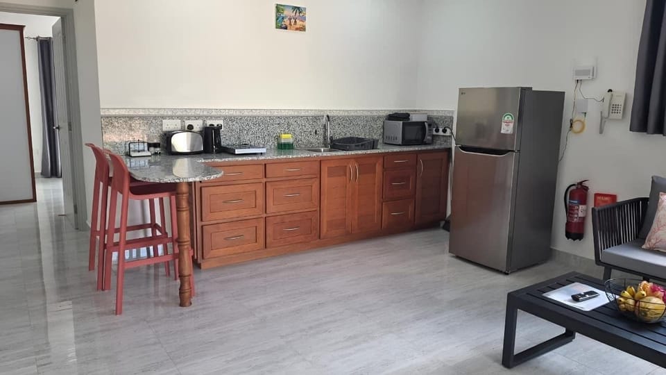 Deluxe Double Room | Private kitchen | Full-size fridge, stovetop, toaster, rice cooker