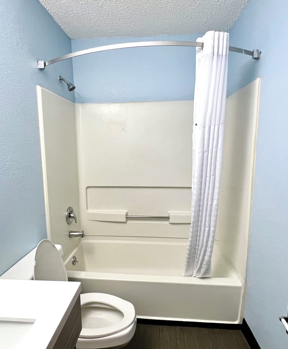 Combined shower/tub, hair dryer, towels, soap