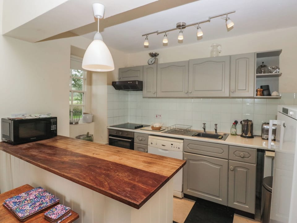 Fridge, toaster, cookware/dishes/utensils